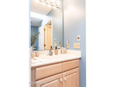 Located in the Pinehurst No. 6 neighborhood, this custom-built - photo 38