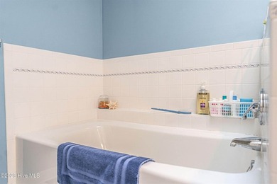 Located in the Pinehurst No. 6 neighborhood, this custom-built - photo 39