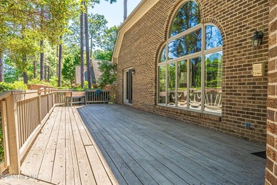 Located in the Pinehurst No. 6 neighborhood, this custom-built - photo 45