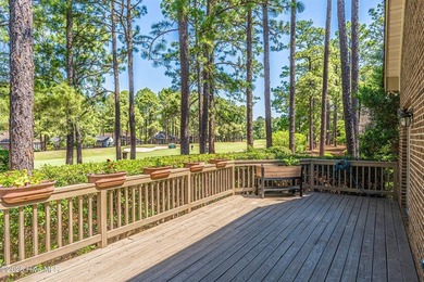Located in the Pinehurst No. 6 neighborhood, this custom-built - photo 46