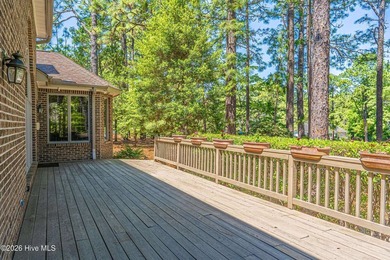 Located in the Pinehurst No. 6 neighborhood, this custom-built - photo 47