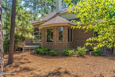 Located in the Pinehurst No. 6 neighborhood, this custom-built - photo 48