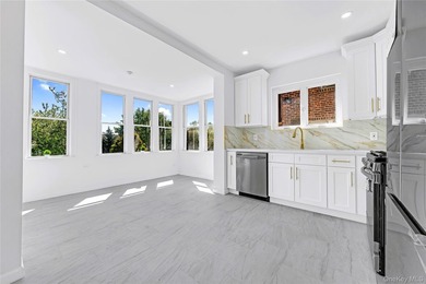 5618 Sylvan Avenue, a fully renovated all-brick home in the - photo 13