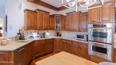 Welcome to 370 Lake Dornoch Drive, an exquisite 6,251 heated sq - photo 18