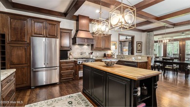 Welcome to 370 Lake Dornoch Drive, an exquisite 6,251 heated sq - photo 19