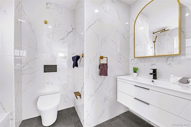 5618 Sylvan Avenue, a fully renovated all-brick home in the - photo 19