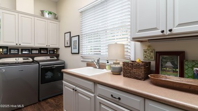 Welcome to 370 Lake Dornoch Drive, an exquisite 6,251 heated sq - photo 28