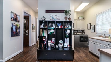 Welcome to 370 Lake Dornoch Drive, an exquisite 6,251 heated sq - photo 29
