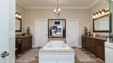 Welcome to 370 Lake Dornoch Drive, an exquisite 6,251 heated sq - photo 33