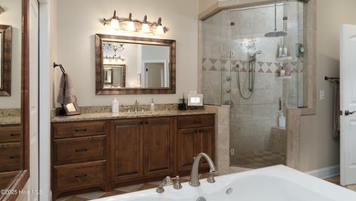 Welcome to 370 Lake Dornoch Drive, an exquisite 6,251 heated sq - photo 35