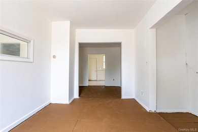 Colonial-style home featuring 4 bedrooms, 1.5 baths, formal - photo 2