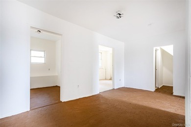 Colonial-style home featuring 4 bedrooms, 1.5 baths, formal - photo 9