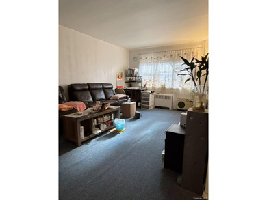 Located just a 2-minute walk from Queens College, this property - photo 4