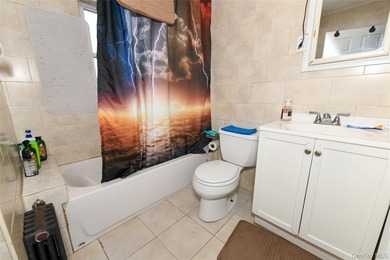 Well maintained two family in residential Rosedale. Both floors - photo 12