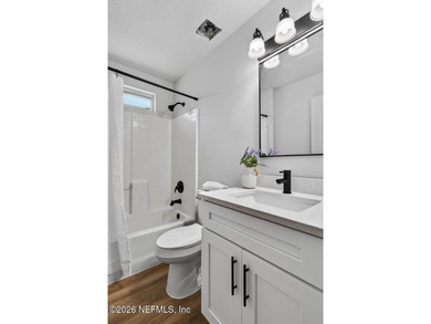 Beautifully renovated 3-bedroom, 2-bath home with a 2-car garage - photo 25