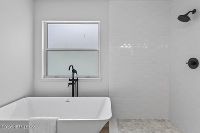 Beautifully renovated 3-bedroom, 2-bath home with a 2-car garage - photo 36