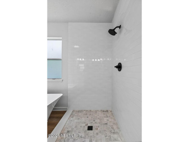 Beautifully renovated 3-bedroom, 2-bath home with a 2-car garage - photo 38