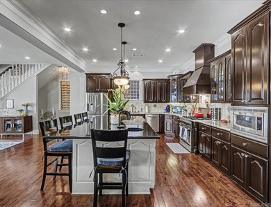 Experience luxury lake living at its finest in the prestigious - photo 8