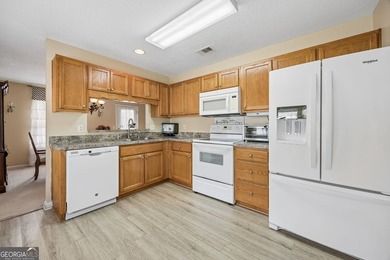 As you arrive at this Baytown-style home, you're welcomed by a - photo 11