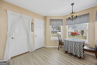 As you arrive at this Baytown-style home, you're welcomed by a - photo 13