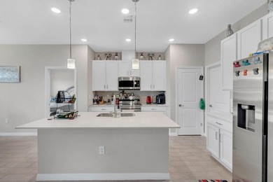 This 3-bedroom, 2-bath home with a 2-car garage was built in - photo 4