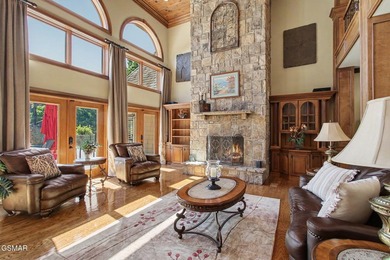 THIS MAGNIFICENT SMOKY MOUNTAIN ESTATE BOASTS 11,312 SQ FT OF - photo 17