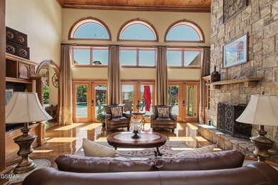 THIS MAGNIFICENT SMOKY MOUNTAIN ESTATE BOASTS 11,312 SQ FT OF - photo 18