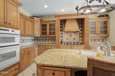 THIS MAGNIFICENT SMOKY MOUNTAIN ESTATE BOASTS 11,312 SQ FT OF - photo 24