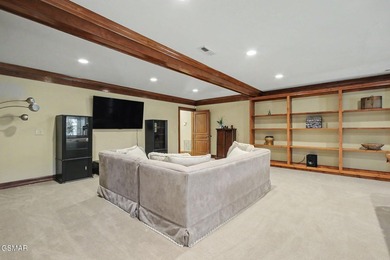 THIS MAGNIFICENT SMOKY MOUNTAIN ESTATE BOASTS 11,312 SQ FT OF - photo 33