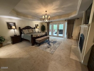 THIS MAGNIFICENT SMOKY MOUNTAIN ESTATE BOASTS 11,312 SQ FT OF - photo 39