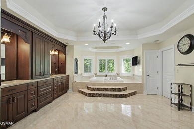 THIS MAGNIFICENT SMOKY MOUNTAIN ESTATE BOASTS 11,312 SQ FT OF - photo 45