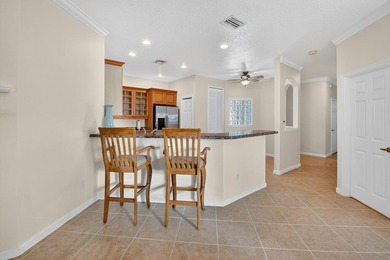 Welcome to this spacious 3-bedroom, 2-bath condo located in the - photo 12