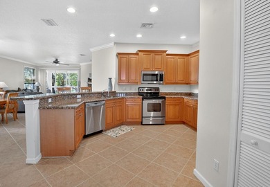 Welcome to this spacious 3-bedroom, 2-bath condo located in the - photo 17