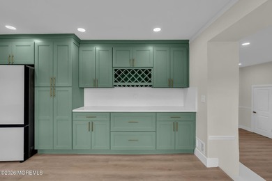 Welcome home to this beautifully remodeled ranch where modern - photo 4
