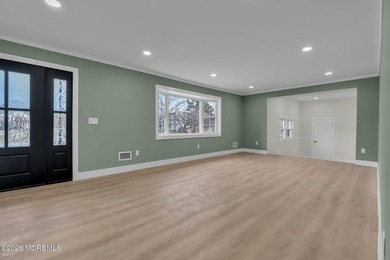 Welcome home to this beautifully remodeled ranch where modern - photo 5