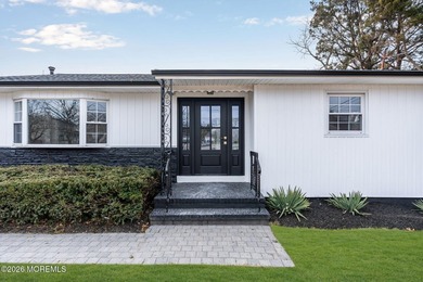 Welcome home to this beautifully remodeled ranch where modern - photo 7