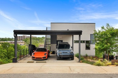 Perched above The Capitol, this contemporary retreat is designed - photo 3