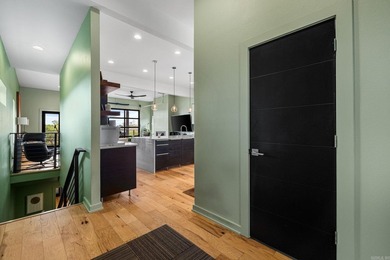 Perched above The Capitol, this contemporary retreat is designed - photo 7