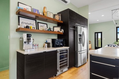 Perched above The Capitol, this contemporary retreat is designed - photo 9
