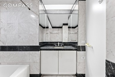 Perched on the 43rd floor of the iconic CitySpire tower, this - photo 14