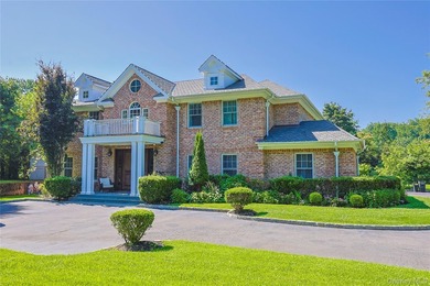 Located in the prestigious Village of Roslyn Harbor, this - photo 2