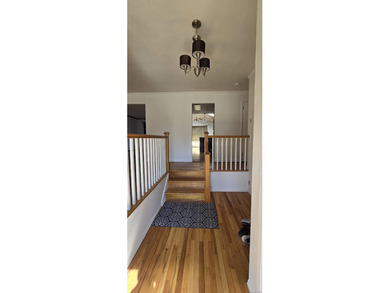 A beautifully maintained ranch situated on a spacious 70' x 100' - photo 2