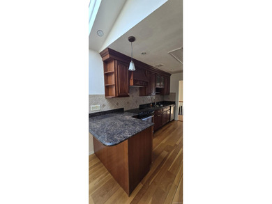 A beautifully maintained ranch situated on a spacious 70' x 100' - photo 3
