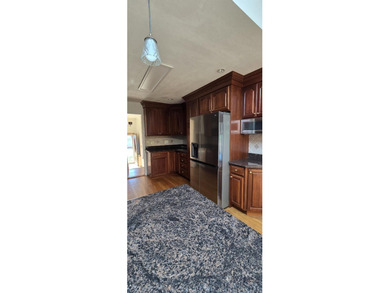 A beautifully maintained ranch situated on a spacious 70' x 100' - photo 4