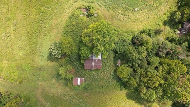 Discover this expansive ridge-top tillable farm, perfectly - photo 12