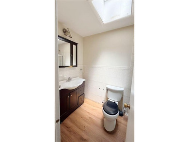 Two dwelling brick house in prime of Bath Beach featuring a - photo 12