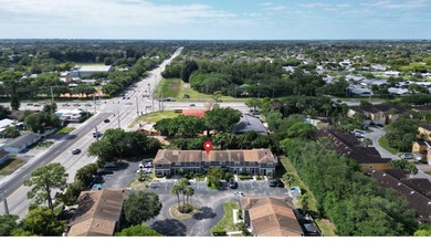 Welcome to this inviting 2-bedroom, 1.5-bath townhouse located - photo 3
