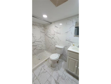 Two dwelling brick house in prime of Bath Beach featuring a - photo 15