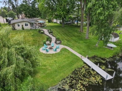 Lake Home For Sale in Wolverine Lake, Michigan