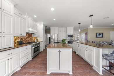 Welcome to one of the most impressive homes in the prestigious - photo 11